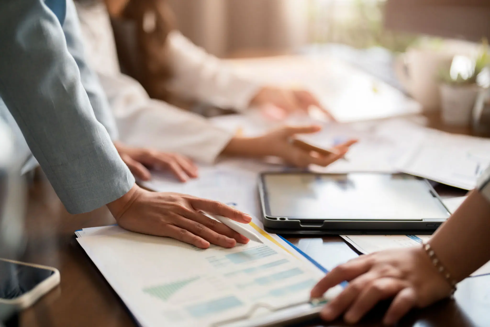 Bank risk and compliance team working on automated policy monitoring and controls